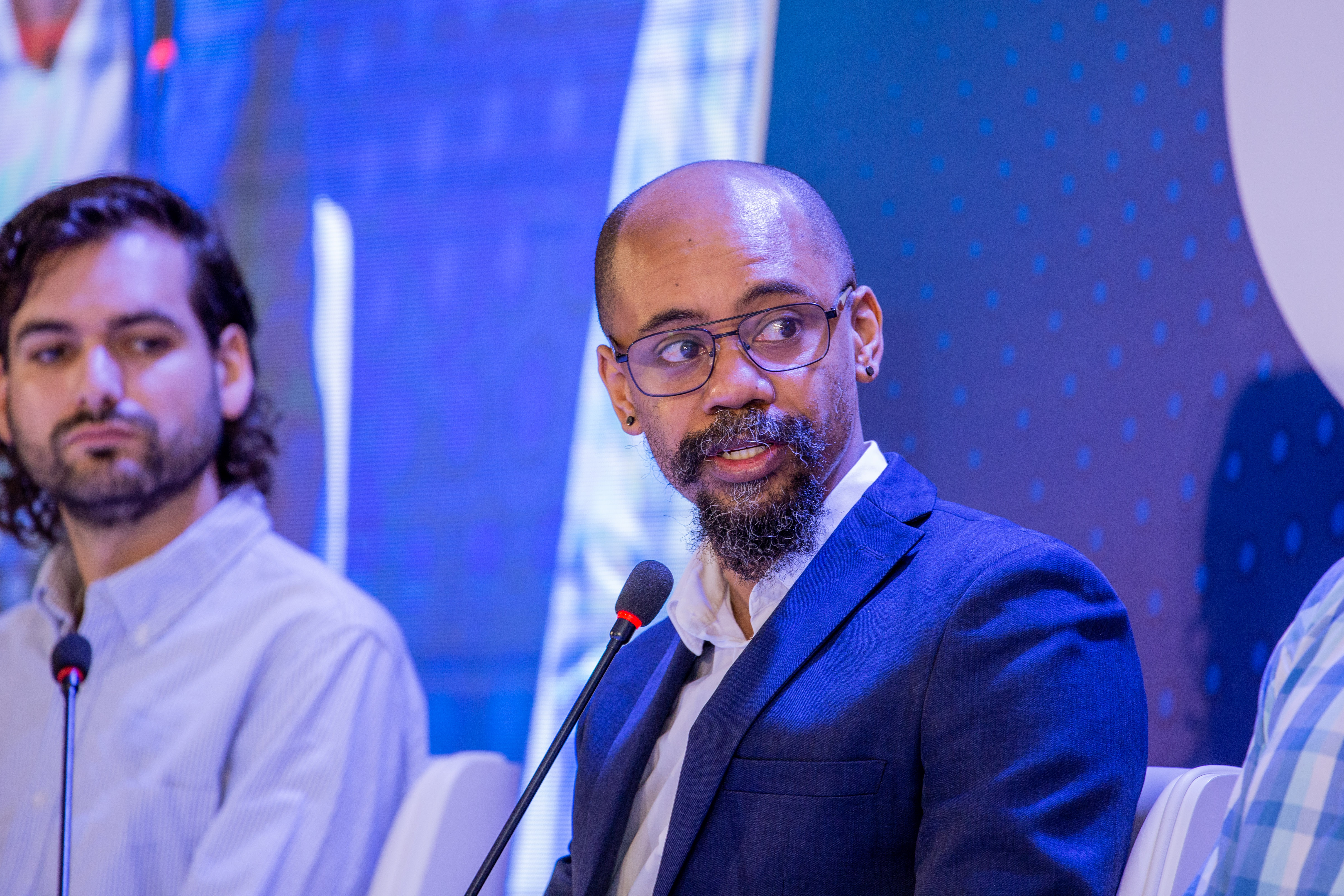 Thaheer Mullins on a panel at a Deep Tech Summit in Uganda